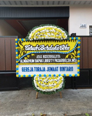 Papan Bunga Duka di Manulai Ii